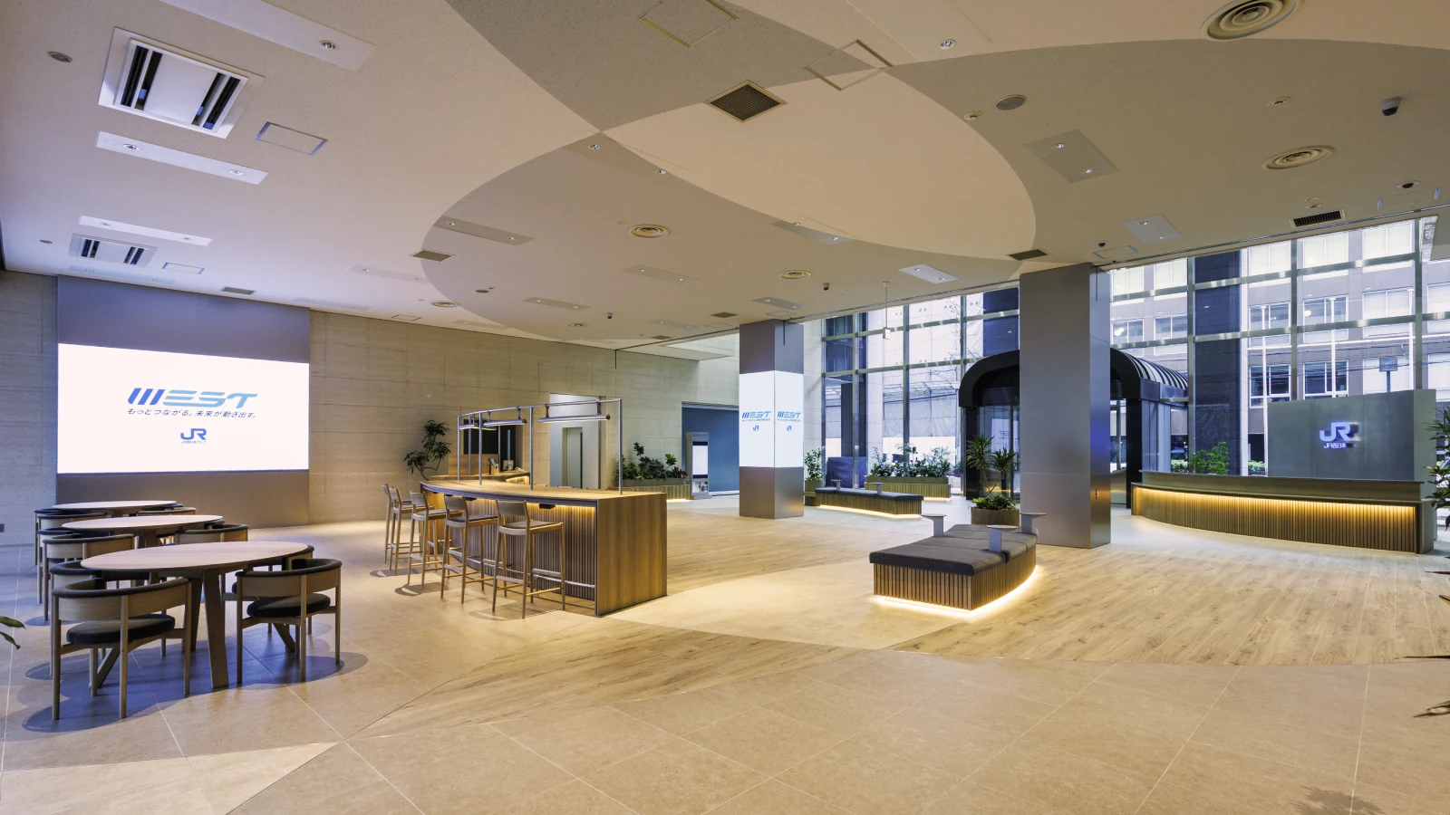JR West headquarters lobby in Osaka after its renewal, for which Utsubo created a digital installation that turns employee messages into a real-time 3D city