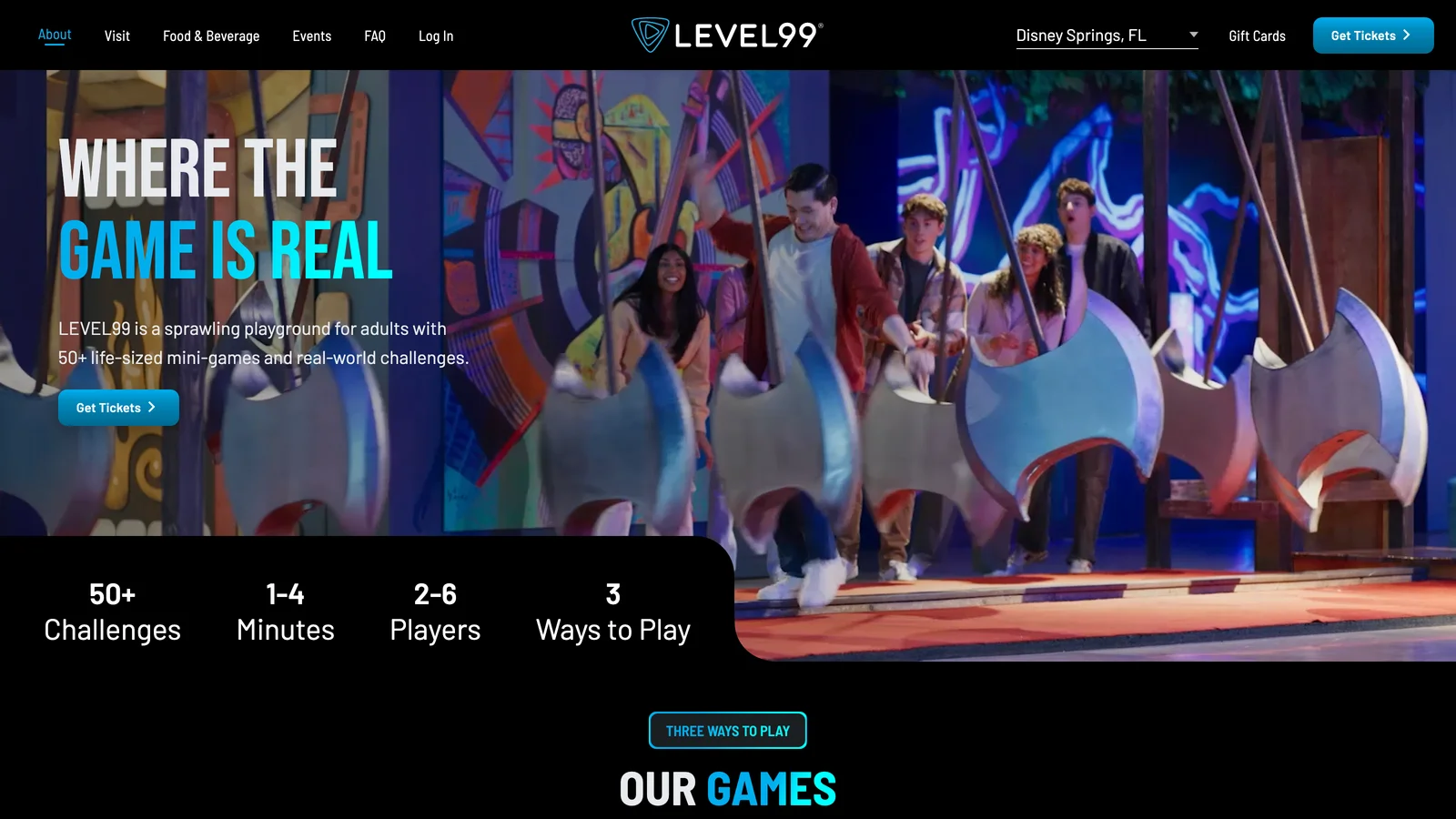 Level99 challenge room: players pushing through oversized physical obstacles in a life-sized mini-game, tracked by RFID wristband rather than cameras
