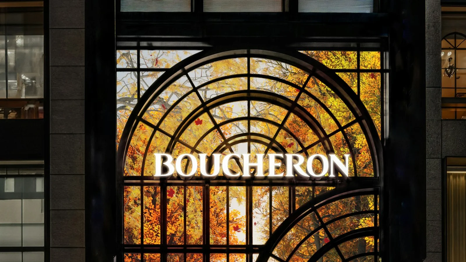Boucheron Tokyo flagship, a 28-metre facade of French arches rendered as a projected digital garden on switchable privacy glass