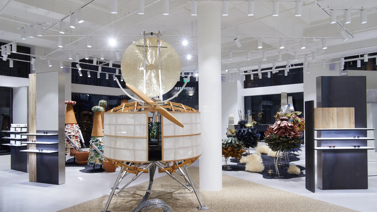 Gentle Monster flagship interior with large-scale kinetic robotic sculptures