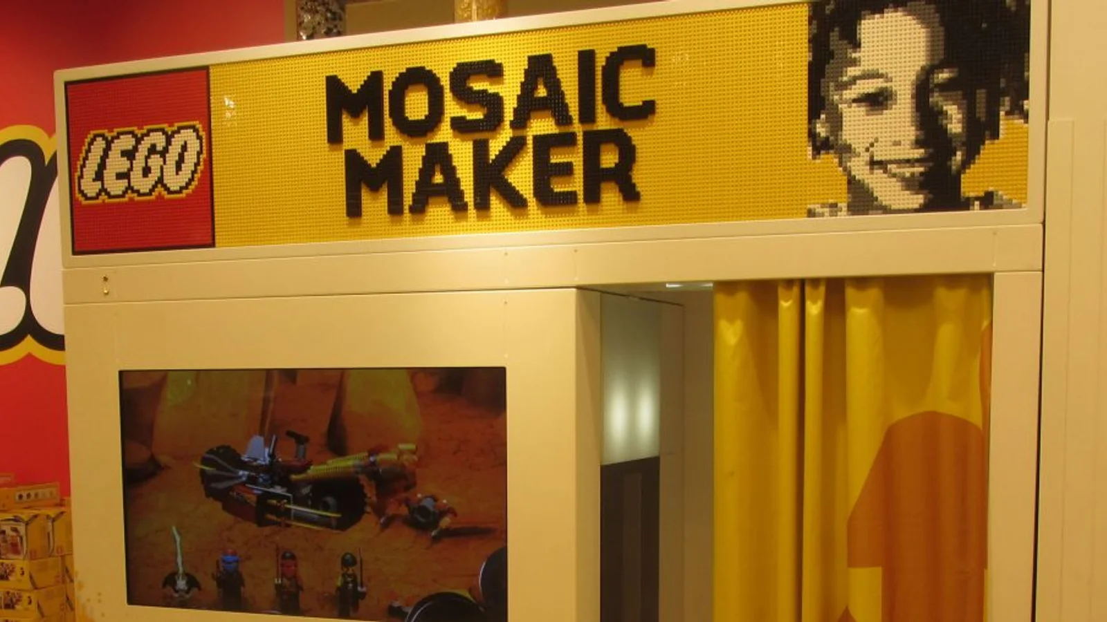 LEGO Mosaic Maker booth, which photographs a customer and outputs a buildable brick portrait